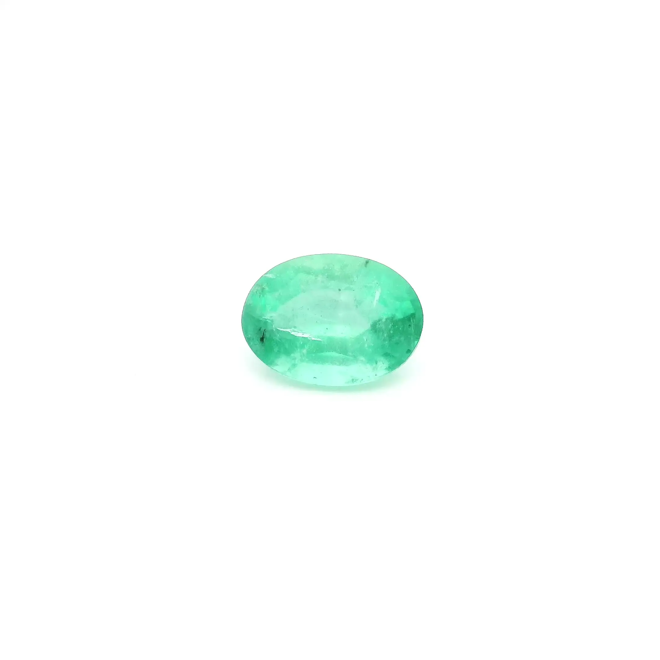 0.71ct Oval Natural Emerald (Colour Green, Clarity Slightly Included, Cut Faceted)